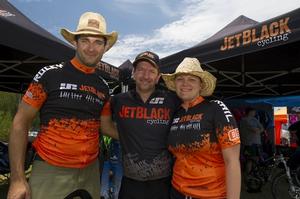 Martin and Juliane Wisata from Rocky Trail Entertainment about to celebrate their 100th event with Tony Simmonds from JetBlack Cycling (centre), major sponsor of the JetBlack 24 Hour since 2009.